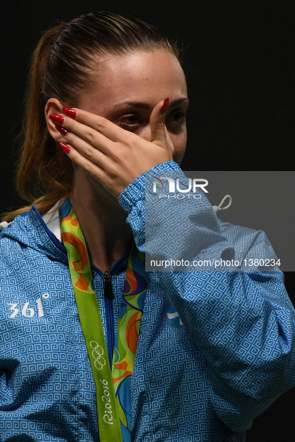 Anna Korakaki of Greece reacts during the awarding ceremony of women's 25m pistol final of shooting at the 2016 Rio Olympic Games in Rio de...