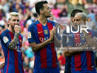 Lionel Messi, Sergio Busquets and Javier Mascherano during the presentation of the Barcelona team 2016-17, held in the Camp Nou stadium, on...