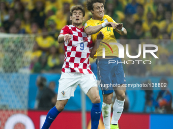 SAO PAULO BRAZIL--12 June: Jelavic and David Luiz in the match between Brazil and Croatia in the group stage of the 2014 World Cup, for the...