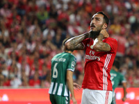 Benfica's forward Kostas Mitroglou reacts during the Portuguese League football match SL Benfica vs Vitoria Setubal FC at Luz stadium in Lis...