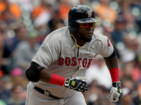 Boston Red Sox designated hitter David Ortiz (34) hits a double in the first inning of a baseball game against the Detroit Tigers in Detroit...