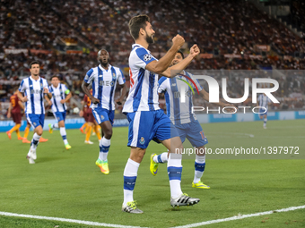 Felipe of Porto celebrates scoring his side first goal during the UEFA Champions League playoff match between AS Roma and FC Porto, at Olymp...