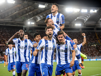 Felipe of Porto celebrates scoring his side first goal during the UEFA Champions League playoff match between AS Roma and FC Porto, at Olymp...