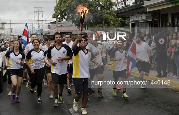 Students run with the torch symbolizing independence during the celebration to commemorate the Independence Day in Alajuela, Costa Rica, Sep...