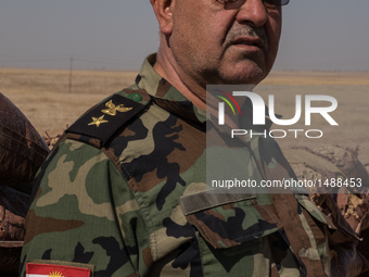 Major Ashad Abdullah inspect the Peshmerga forces between Khasir and Mosul, on October 8, 2016. Military facilities of Kurdish Peshmerga for...