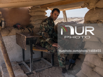 Peshmerga soldier looking out for ISIS forces  on the outskirt of Mosul, on October 8, 2016. Military facilities of Kurdish Peshmerga forces...