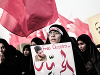 Bahrain , Shakhura - thousands attended opposition demonstration , protesters raised slogans demanding to release martyr Abdulaziz AlAbbar b...