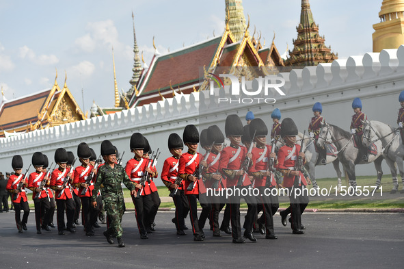 Thai Royal Guard march outside the Grand Palace in Bangkok, Thailand, Oct. 14, 2016. The remains of Thai King Bhumibol Adulyadej, who passed...