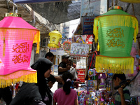 A Palestinian vendors displays imported traditional Ramadan lanterns at a market in Rafah in the southern Gaza Strip on June 28, 2014. Start...
