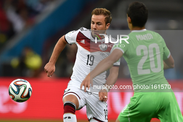 PORTO ALEGRE, 30.06.2014: BRAZIL: Mario Gotze and Mandi in match between Germany and Algeria, corresponding to the round of the last 16 of t...