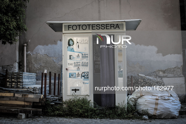 A passport photo machine in the historic center of L'Aquila, destroyed after the quake of April 6, 2009. 