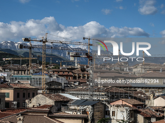 A general view of L'Aquila City with many cranes, the reconstruction process is starting, on July 2, 2014. (