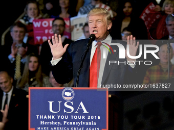 President-Elect Donald Trump gives a speech at a post-election Thank You Tour event with Vice-President-Elect Mike Pence, at the Giant Cente...
