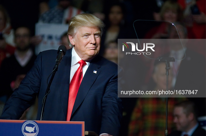President-Elect Donald Trump gives a speech at a post-election Thank You Tour 2016, with Vice-President-Elect Mike Pence, one month before M...