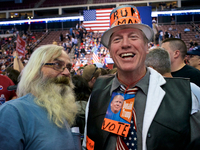 Larry Shaap, of Harrisburg, PA (right) attends a Trump rally at the Giant Center in Hershey, PA, in Central Pennsylvania, on Fri. Nov. 4, 20...