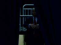 Republican presidential candidate Donald Trump waits behind a curtain as he is about total the stage at a rally at the Giant Center in Hersh...