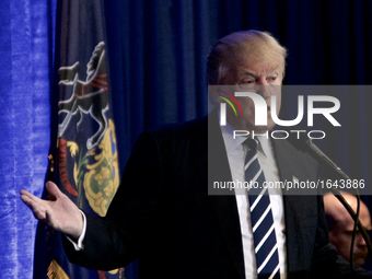 Republican presidential candidate Donald Trump delivers a speech outlining his health care policy at an event with Vice-presidential candida...