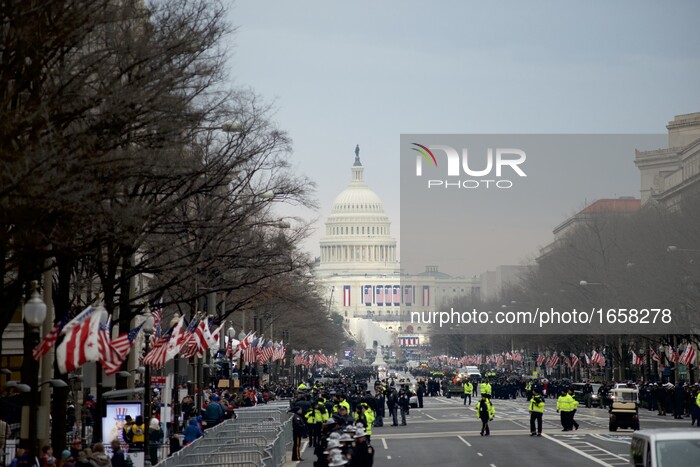 Protestors and supporters gather along the of the Parade Route and at the National Mall in Washington D.C., ahead of the Inauguration of Don...