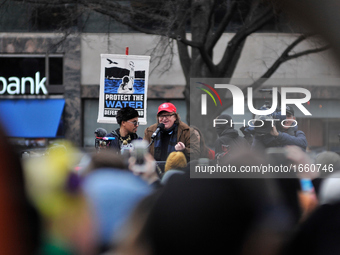 Michael Moore speaks to the crowd gathered at Franklin Square Park as protests erupt after Donald Trump becomes the 45th President of the Un...