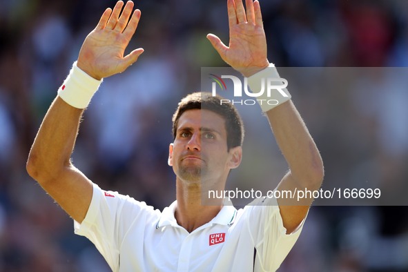 (140704) -- LONDON, July 4, 2014 () -- Serbia's Novak Djokovic gestures to spectators after winning the men's singles semi-final match again...