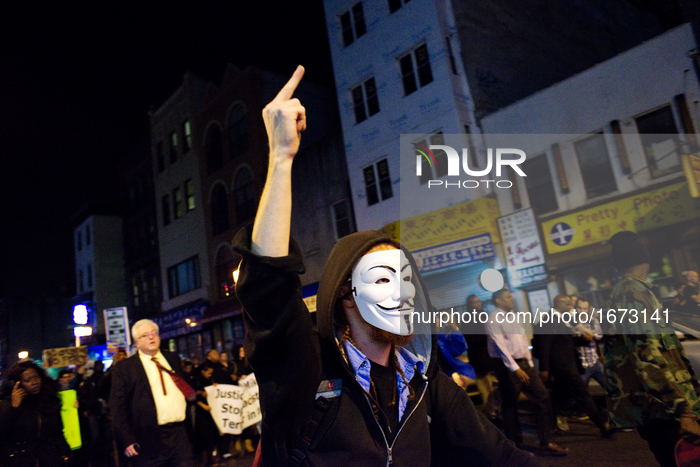 Protesters march on North Broad and Market Streets, in Center City, Philadelphia, PA, during a November 24th, 2014 protest in following a ju...
