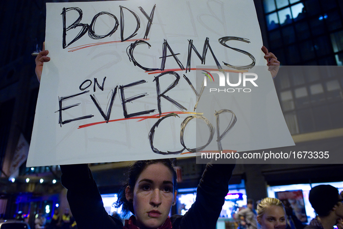 Protesters march on North Broad and Market Streets, in Center City, Philadelphia, PA, during a November 24th, 2014 protest in following a ju...