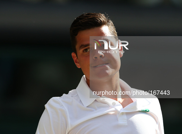 (140705) -- LONDON, July 5, 2014 () -- Milos Raonic of Canada reacts during the men's singles semifinal match against Roger Federer of Switz...