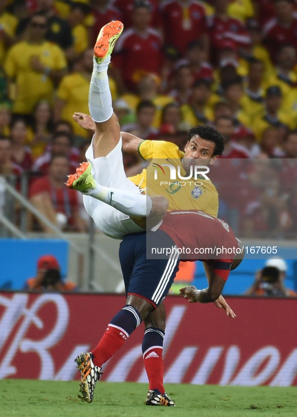 (140704) -- FORTALEZA, July 4, 2014 () -- Brazil's Fred (up) vies with Colombia's Pablo Armero during a quarter-finals match between Brazil...