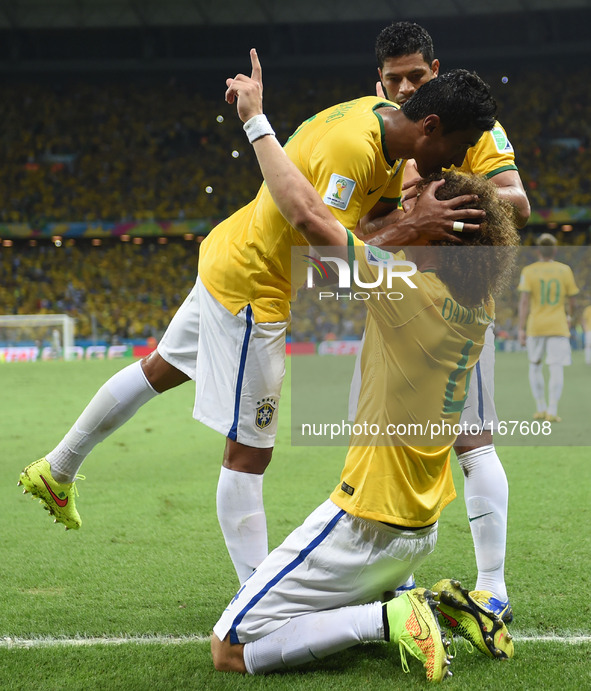 (140704) -- FORTALEZA, July 4, 2014 () -- Brazil's David Luiz (R, front) celebrates his goal during a quarter-finals match between Brazil an...