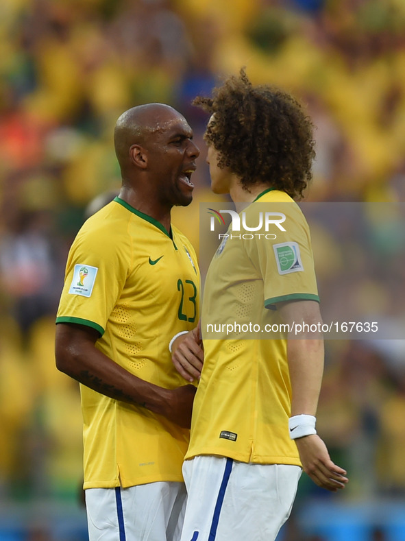 (140704) -- FORTALEZA, July 4, 2014 () -- Brazil's Maicon (L) and David Luiz celebrate a goal by Thiago Silva during a quarter-finals match...