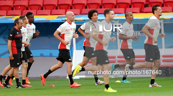 (140704) -- BRASILIA, July 4, 2014 () -- Belgium's players warm up during a training session in Brasilia, Brazil, on July 4, 2014, ahead of...