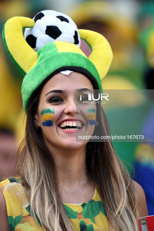 (140704) -- FORTALEZA, July 4, 2014 () -- A Brazil's fan is seen before a quarter-finals match between Brazil and Colombia of 2014 FIFA Worl...