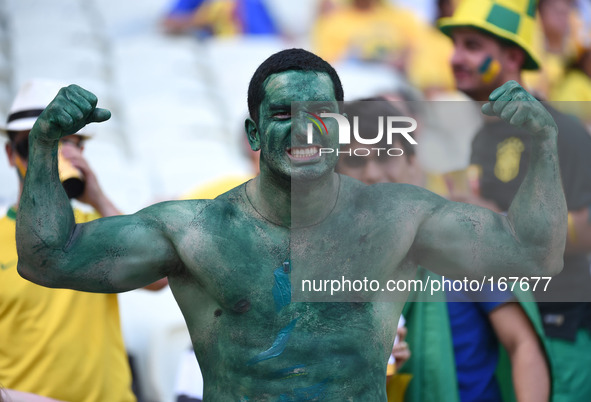 (140704) -- FORTALEZA, July 4, 2014 () -- A Brazil's fan poses before a quarter-finals match between Brazil and Colombia of 2014 FIFA World...