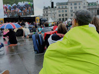 Crowds gather in central London to watch the Tour de France come to London. (