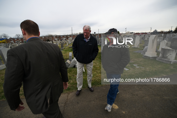 Detectives talk to Richard Levy, Cemetery Manager at Han Nebo Jewish cemetery, in Philadelphia, PA, on Feb. 27, 2017.
The Jewish cemetery is...
