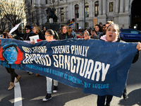 Local community organizations Juntos and Mijente  host a small rally outside City Hall, followed by a march past Arch Street United Methodis...