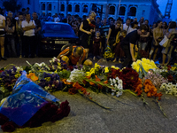 KIEV, UKRAINE - JULY 18: People lay flowers under the Netherlands Embassy in Kiev feeling for victims of Malaysia Airlines plane shot down b...