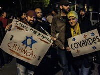 Palestinians living in São Paulo and supporters of the cause held on Tuesday at the Pacaembu neighborhood of Sao Paulo, a vigil calling for...