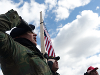 Veterans salut the American flag during the Pledge of Allegiance at a pro-trump rally in Bensalem, PA, on March 4th, 2017.
Similar small eve...