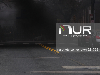 The street turns dark as Philadelphia Fire Department responds to a PECO Substation fire, on March 7th, 2017, in Philadelphia, PA. The fire...