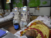 Bangladeshi dialysis patient getting their blood cleaned by dialysis machine at National Institute of Kidney Diseases and Urology in Dhaka,...