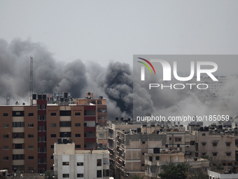 
Smoke rises after an Israeli air strike in Gaza City on 21 July 2014. israeli military operation continue on Gaza strip since 8th-July, the...