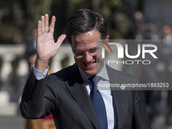 Dutch Prime Minister Mark Rutte waves as he arrives for an EU summit at the Palazzo dei Conservatori in Rome on Saturday, March 25, 2017. EU...