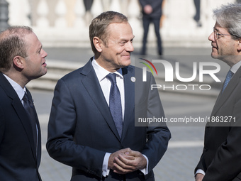 From left, Malta's Prime Minister Joseph Muscat, European Council President Donald Tusk and Italian Prime Minister Paolo Gentiloni during ar...