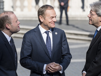 From left, Malta's Prime Minister Joseph Muscat, European Council President Donald Tusk and Italian Prime Minister Paolo Gentiloni during ar...