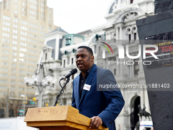 Rev. Holston, Executive Director of Philadelphians Organized to Witness, Empower & Rebuild (POWER) speaks at a April 4, 2017 Rally for Racia...