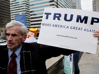 Pro-Trump supporter Jerry Lambert shows up as protestors gather in Center City Philadelphia, PA, ahead of the April 15 Tax Day March. Around...