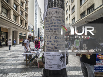 People observe job ads in the center of São Paulo, on April 19, 2017. The world unemployment rate is expected to rise from 5.7 percent in 20...