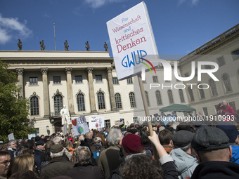 People gather to attend the 'March for Science' to express their support to science and research at the Humboldt University in Berlin, Germa...