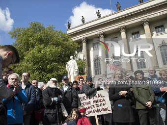 People gather to attend the 'March for Science' to express their support to science and research at the Humboldt University in Berlin, Germa...